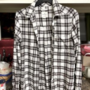 American eagle flannel. Barely used and very cute and comfortable.